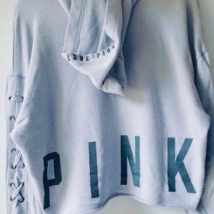 PINK CROP HOODIE W/ LACE UP SLEEVES IN PASTEL BLUE